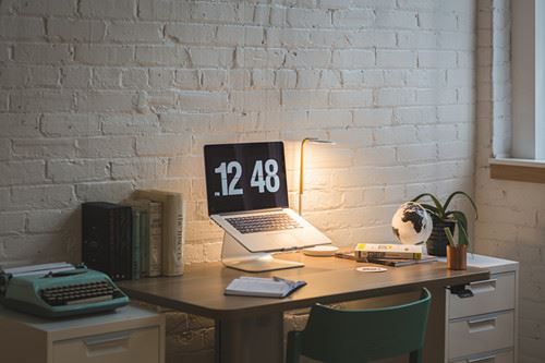 Canva - Macbook on Desk Beside Table Lamp_ Canva - Macbook on Desk Beside Table Lamp_